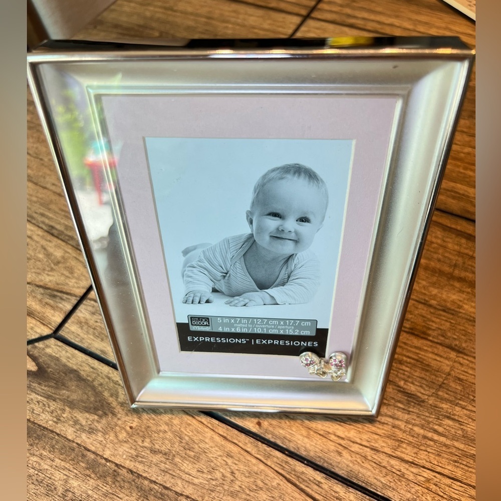 Picture frame Silver Two Tone Frame with Mat by Studio Décor".  5X7 
Baby girl